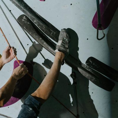 Person holding a stable pose, showing focus and physical control.